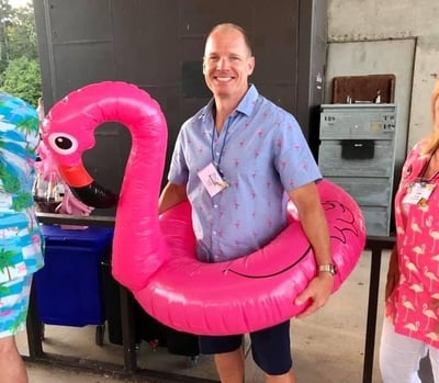 Brandon Fernald with a flamingo